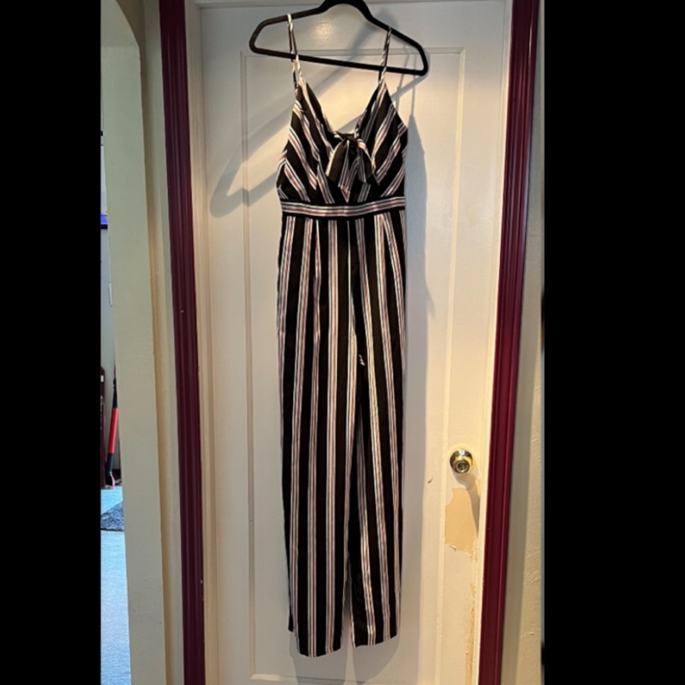 Premier Amour: Black, white, and pink striped jumpsuit (Size 6)